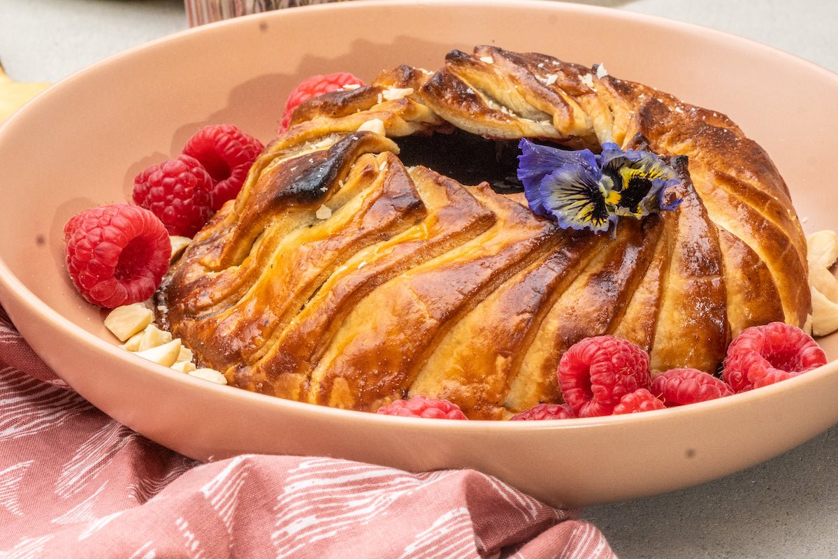 Easy Baked Brie with Raspberry Orange Balsamic Glaze - Texas Hill Country Olive Co.