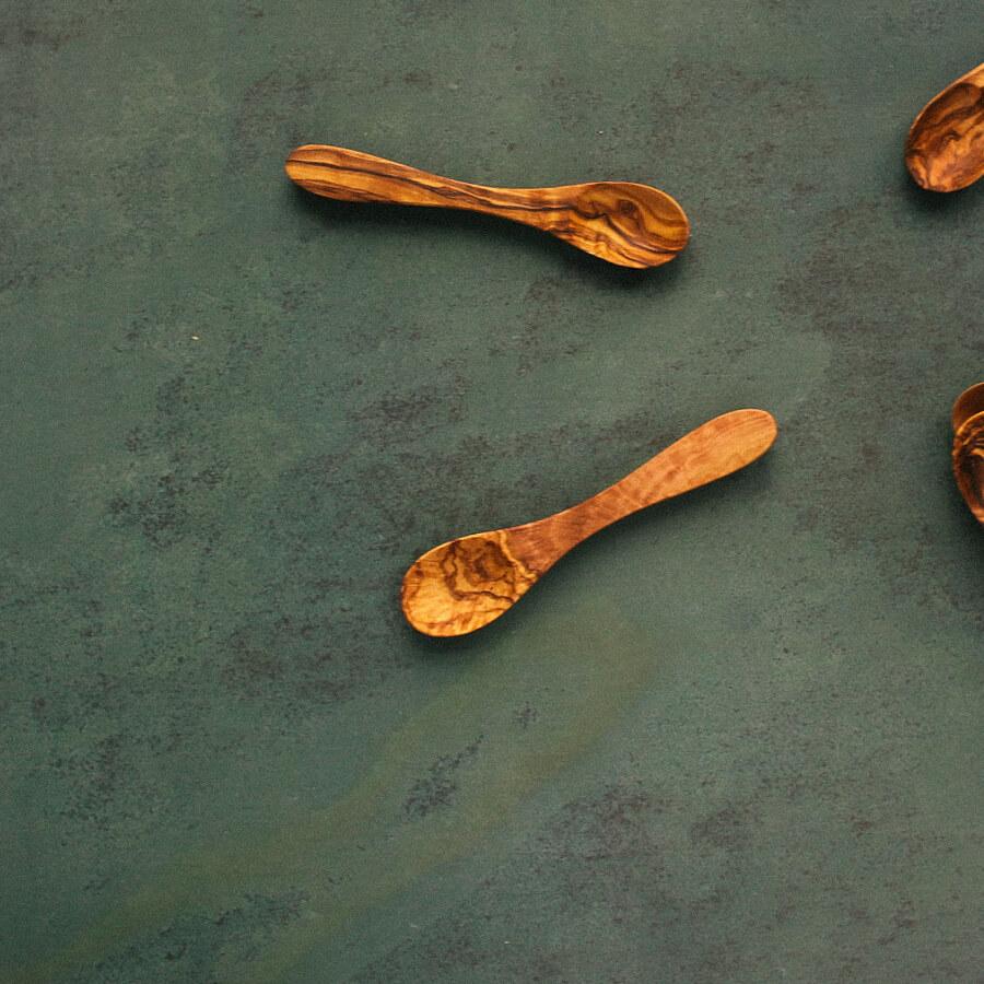 http://texashillcountryoliveco.com/cdn/shop/products/8-olive-wood-spoon-texas-hill-country-olive-co-100705.jpg?v=1681826685
