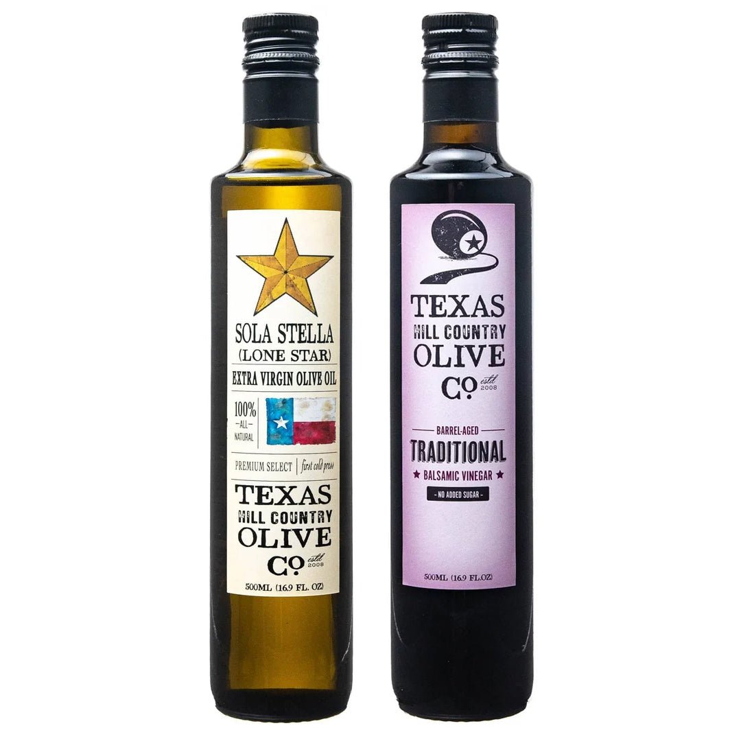 500 ml bottles of Sola Stella Extra Virgin Olive Oil and Traditional Aged Balsamic Vinegar side by side.